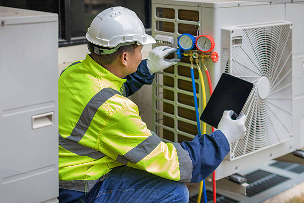 Professional Hvac technician working in Helm, CA
